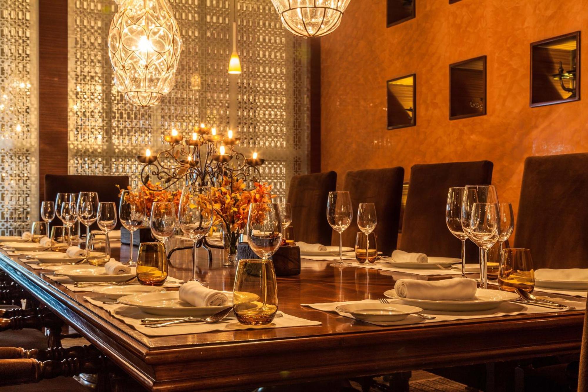 The Leela Ambience Gurugram Hotel & Residences - The Luxury Urban Sanctuary Gurgaon Esterno foto A dining room table set for a meal